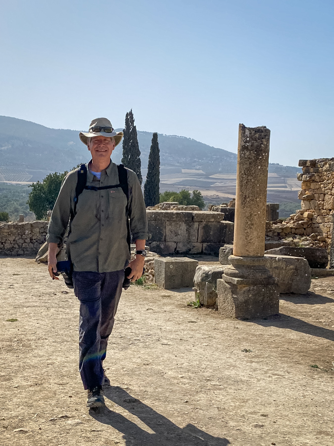Photographer in Ruins in Volubilis, Morocco